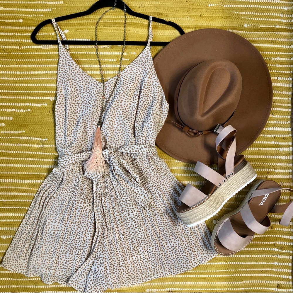 Pebble animal print pleated tie waist romper